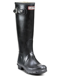 Glossy rubber rain boots with a legendary Hunter fit and comfort. Glossy rubber rain boots with a legendary Hunter fit and comfort.