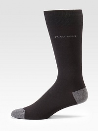 Lightweight and breathable solid dress socks with logo detail and heel and toe contrast, finished in a smooth, stretch cotton blend.Set of 3Mid-calf height75% cotton/23% polyesteramide/2% elastaneMachine washImported Lightweight and breathable solid dress socks with logo detail and heel and toe contrast, finished in a smooth, stretch cotton blend.Set of 3Mid-calf height75% cotton/23% polyesteramide/2% elastaneMachine washImported