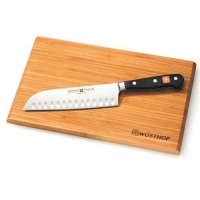 Wusthof 7-in. Classic Hollow Edge Santoku Knife with Bamboo Board. Wusthof 7-in. Classic Hollow Edge Santoku Knife with Bamboo Board.