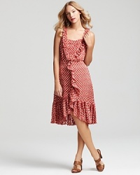 Romantic whimsy arrives with a striking Tory Burch polka dot dress, featuring flounced ruffle trim and a feminine, vintage-inspired silhouette. Romantic whimsy arrives with a striking Tory Burch polka dot dress, featuring flounced ruffle trim and a feminine, vintage-inspired silhouette.