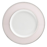 World-renowned fashion designer Monique Lhuillier collaborated with Waterford to create this fine china plate in beautiful blush tones adapted from her brilliant couture bridal gowns and red carpet creations.