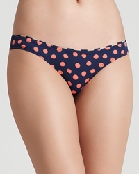 Ondademar mixes and matches complementary patterns to craft this eye-catching graphic bikini. Ondademar mixes and matches complementary patterns to craft this eye-catching graphic bikini.