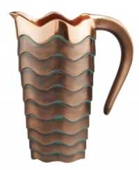 Featuring a bold new look for Nambe's signature metal, the handcrafted Copper Canyon pitcher captures the beauty of the American Southwest in radiant copper with a rippled green patina. Featuring a bold new look for Nambe's signature metal, the handcrafted Copper Canyon pitcher captures the beauty of the American Southwest in radiant copper with a rippled green patina.