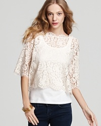 Embrace the lace--this beautiful, lightweight top with lace overlay looks great over a clean white cami or a colorful tank for a fun peek-through contrast. Embrace the lace--this beautiful, lightweight top with lace overlay looks great over a clean white cami or a colorful tank for a fun peek-through contrast.