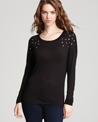 Studded shoulders are definitive rock-star chic. Add an open back panel, and you're ready to go wild with this Vintage Havana tee. Studded shoulders are definitive rock-star chic. Add an open back panel, and you're ready to go wild with this Vintage Havana tee.