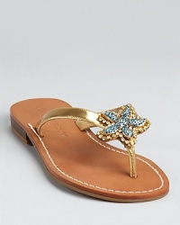 Take a trip to the seaside with these IVANKA TRUMP sandals, adorned with a lively starfish in shimmering rhinestones. Take a trip to the seaside with these IVANKA TRUMP sandals, adorned with a lively starfish in shimmering rhinestones.