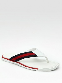 Leather thong sandal with signature blue/red/blue web detail and micro guccissima trim. Rubber sole Made in Italy Leather thong sandal with signature blue/red/blue web detail and micro guccissima trim. Rubber sole Made in Italy