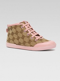 Lace-up design in GG fabric with leather trim, signature web detail and cozy rubber sole.Lace-upGG fabric and leather upperRubber solePadded insoleMade in Italy Lace-up design in GG fabric with leather trim, signature web detail and cozy rubber sole.Lace-upGG fabric and leather upperRubber solePadded insoleMade in Italy