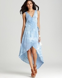 A cascading high/low hem lends drama to this Gypsy 05 maxi dress, rendered in a wrap silhouette for a universally flattering fit. A cascading high/low hem lends drama to this Gypsy 05 maxi dress, rendered in a wrap silhouette for a universally flattering fit.