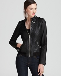 This MICHAEL Michael Kors leather jacket accelerates into the season with subtle quilting and silver-tone hardware for the ultimate in tough luxe. Slip it on and send your style into overdrive. This MICHAEL Michael Kors leather jacket accelerates into the season with subtle quilting and silver-tone hardware for the ultimate in tough luxe. Slip it on and send your style into overdrive.