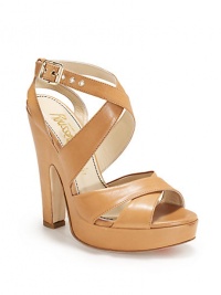 THE LOOKCrisscrossed strapsAdjustable ankle strapCovered heel 5 (125mm)Wooden platform, 1 (25mm)Compares to a 4 heel (100mm)THE MATERIALLeather upperLeather lining and soleORIGINMade in Italy THE LOOKCrisscrossed strapsAdjustable ankle strapCovered heel 5 (125mm)Wooden platform, 1 (25mm)Compares to a 4 heel (100mm)THE MATERIALLeather upperLeather lining and soleORIGINMade in Italy