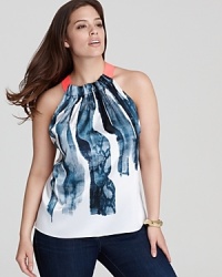 Infuse your style with artistic inspiration in this Tahari Woman Plus blouse, boasting graphic strokes of print and acid-bright accents for a modern statement. Infuse your style with artistic inspiration in this Tahari Woman Plus blouse, boasting graphic strokes of print and acid-bright accents for a modern statement.