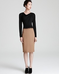 Exude artful elegance in this two-tone Escada dress with flattering cowl neckline. Exude artful elegance in this two-tone Escada dress with flattering cowl neckline.