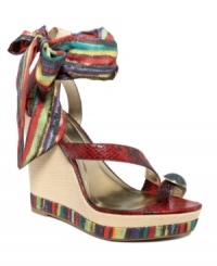 Indulge in the boldness of Brasil in FALCHI by Falchi's Cruz platform wedge sandals. A brightly-patterned fabric ankle strap adds edge while the bejeweled toe ring keeps things super sexy. Indulge in the boldness of Brasil in FALCHI by Falchi's Cruz platform wedge sandals. A brightly-patterned fabric ankle strap adds edge while the bejeweled toe ring keeps things super sexy.
