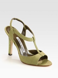 Slightly textured canvas in a t-strap design with a stacked heel and stretchy slingback. Stacked heel, 4 (100mm)Canvas upperLeather lining and solePadded insoleMade in ItalyOUR FIT MODEL RECOMMENDS ordering one size up as this style runs small. Slightly textured canvas in a t-strap design with a stacked heel and stretchy slingback. Stacked heel, 4 (100mm)Canvas upperLeather lining and solePadded insoleMade in ItalyOUR FIT MODEL RECOMMENDS ordering one size up as this style runs small.