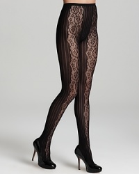 DKNY adds feminine charm to these textured tights with a floral-lace backseam. DKNY adds feminine charm to these textured tights with a floral-lace backseam.