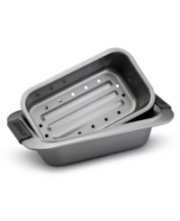 The breadwinner! Say good-bye to crumbly mishaps and start baking cakes and breads like a pro with this top-notch set from Anolon. New proprietary coating ensures superior release and makes cleanup a snap. Silicon-enhanced handles are steady and slip-free, while the pan's substantial weight provides durability and helps prevent warping. The breadwinner! Say good-bye to crumbly mishaps and start baking cakes and breads like a pro with this top-notch set from Anolon. New proprietary coating ensures superior release and makes cleanup a snap. Silicon-enhanced handles are steady and slip-free, while the pan's substantial weight provides durability and helps prevent warping.