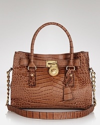 Clean and richly embossed, this MICHAEL Michael Kors satchel will make a substantive addition to your accessory repertoire. Carry it for effortless style on-duty or off. Clean and richly embossed, this MICHAEL Michael Kors satchel will make a substantive addition to your accessory repertoire. Carry it for effortless style on-duty or off.