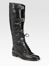 Adjustable buckle straps accent this leather silhouette with a goldtone detail on the stacked heel. Stacked heel, 1¼ (30mm)Shaft, 16Leg circumference, 13½Leather upperAdjustable buckle strapsLeather lining and solePadded insoleMade in Italy Adjustable buckle straps accent this leather silhouette with a goldtone detail on the stacked heel. Stacked heel, 1¼ (30mm)Shaft, 16Leg circumference, 13½Leather upperAdjustable buckle strapsLeather lining and solePadded insoleMade in Italy