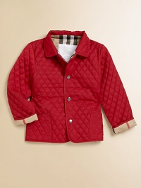 A layer of quilted warmth, comfort and style, that's ultra versatile, ultra easy.Shirt collarLong sleeves with turn-back check cuffsFull snap frontPatch pocketsPolyesterMachine washImported Please note: Number of snaps may vary depending on size ordered. A layer of quilted warmth, comfort and style, that's ultra versatile, ultra easy.Shirt collarLong sleeves with turn-back check cuffsFull snap frontPatch pocketsPolyesterMachine washImported Please note: Number of snaps may vary depending on size ordered.