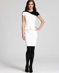 Bold color block details in the most iconic color and a classic peplum enliven this fashion-forward Cynthia Steffe dress with two of this season's most sought-after trends. Bold color block details in the most iconic color and a classic peplum enliven this fashion-forward Cynthia Steffe dress with two of this season's most sought-after trends.