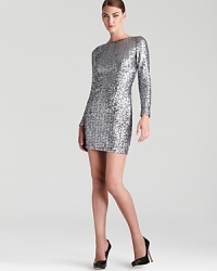 Sparkle all night long in Aqua's sequin-covered sheath, showing off a long sleeve silhouette for chilly but chic nights. Sparkle all night long in Aqua's sequin-covered sheath, showing off a long sleeve silhouette for chilly but chic nights.