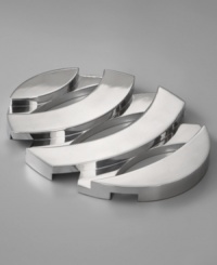 Representing the path of sound waves coming and going, the Echo trivet combines curved bands and a stacked design that elevates hot dishes, plants or vases. In lustrous Nambé alloy, this intriguing centerpiece provides more than just protection for your table. By Neil Cohen. Representing the path of sound waves coming and going, the Echo trivet combines curved bands and a stacked design that elevates hot dishes, plants or vases. In lustrous Nambé alloy, this intriguing centerpiece provides more than just protection for your table. By Neil Cohen.