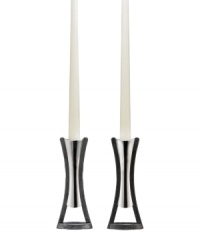See Nambe's signature metal in a whole new light with the beautiful contours of Anvil candlesticks. A rustic, iron-finished base balances lustrous silvertone alloy in Neil Cohen's ultra-modern design. See Nambe's signature metal in a whole new light with the beautiful contours of Anvil candlesticks. A rustic, iron-finished base balances lustrous silvertone alloy in Neil Cohen's ultra-modern design.