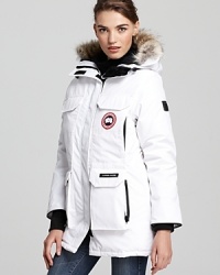 Keep the snow and cold wind out with Canada Goose's popular, heavy-duty parka. The mid-thigh length offers maximum coverage and protection. Keep the snow and cold wind out with Canada Goose's popular, heavy-duty parka. The mid-thigh length offers maximum coverage and protection.