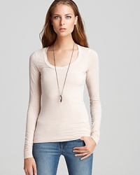 Snug and sleek, this Splendid long sleeve tee is great alone or as a base under your favorite cardigan or fur vest. Mix up the look! Snug and sleek, this Splendid long sleeve tee is great alone or as a base under your favorite cardigan or fur vest. Mix up the look!