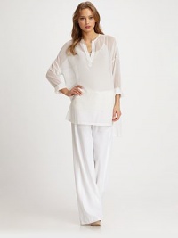 Experience the ultimate in luxurious casual wear with these comfortable wide-leg pants, creating a figure-flattering silhouette. Ruched elastic waistbandZip fly with button closure and drawstring tieBack besom pocketsInseam, about 3263% cupro/37% cottonDry cleanMade in USA of imported fabricModel shown is 5'10 (177cm) wearing US size 4. Experience the ultimate in luxurious casual wear with these comfortable wide-leg pants, creating a figure-flattering silhouette. Ruched elastic waistbandZip fly with button closure and drawstring tieBack besom pocketsInseam, about 3263% cupro/37% cottonDry cleanMade in USA of imported fabricModel shown is 5'10 (177cm) wearing US size 4.