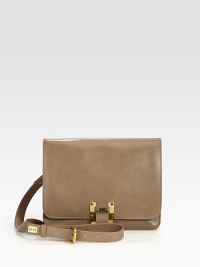 Inspired by the versatility and timelessness of classic design, this modern leather style blends structured utility and radiant elegance.Detachable adjustable shoulder strap, 16½-20½ dropSlide tab flap closureTwo inner compartmentsSuede lining 9½W X 7½H X 2DImported Inspired by the versatility and timelessness of classic design, this modern leather style blends structured utility and radiant elegance.Detachable adjustable shoulder strap, 16½-20½ dropSlide tab flap closureTwo inner compartmentsSuede lining 9½W X 7½H X 2DImported