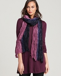 Breathe distinctive life into your everyday look with this Eileen Fisher silk wrap billowing with bold bursts of color. Breathe distinctive life into your everyday look with this Eileen Fisher silk wrap billowing with bold bursts of color.