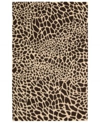 Survival of the prettiest. An exotic print adorns Nourison's Skyland rug in bold, contrasting chocolate and ivory hues, bringing a wildly chic look to any space. The plush wool rug is enhanced with meticulous hand carving for beautiful detail and texture. (Clearance) Survival of the prettiest. An exotic print adorns Nourison's Skyland rug in bold, contrasting chocolate and ivory hues, bringing a wildly chic look to any space. The plush wool rug is enhanced with meticulous hand carving for beautiful detail and texture. (Clearance)
