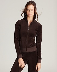Juicy Couture's signature velour hoodie is perfect for lounging on the weekends. Juicy Couture's signature velour hoodie is perfect for lounging on the weekends.
