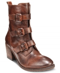 A trio of buckles adds bold detail to the rustic style of Vince Camuto's Dassia booties. A trio of buckles adds bold detail to the rustic style of Vince Camuto's Dassia booties.