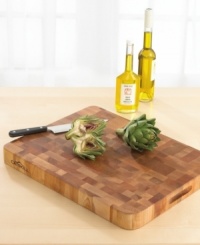 Move to the block. This professional grade cutting board makes slicing and dicing safe and easy. Oiled end-grain maple wood resists chips and nicks for long use. Finger slots provide a secure grip. One-year warranty. Move to the block. This professional grade cutting board makes slicing and dicing safe and easy. Oiled end-grain maple wood resists chips and nicks for long use. Finger slots provide a secure grip. One-year warranty.