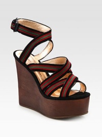 Contrasting suede straps trimmed with patent leather enhance a naturally wooden wedge. Wooden wedge, 5 (125mm)Wooden platform, 1½ (40mm)Compares to a 3½ heel (90mm)Suede and leather upperSuede and leather liningRubber solePadded insoleImportedOUR FIT MODEL RECOMMENDS ordering one half size up as this style runs small. Contrasting suede straps trimmed with patent leather enhance a naturally wooden wedge. Wooden wedge, 5 (125mm)Wooden platform, 1½ (40mm)Compares to a 3½ heel (90mm)Suede and leather upperSuede and leather liningRubber solePadded insoleImportedOUR FIT MODEL RECOMMENDS ordering one half size up as this style runs small.