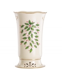 Lenox's popular Holiday pattern - a colorful holly and berry motif - on ivory fine china is the perfect way to add warmth to any gathering. Accented with 24 karat gold. Lenox's popular Holiday pattern - a colorful holly and berry motif - on ivory fine china is the perfect way to add warmth to any gathering. Accented with 24 karat gold.