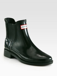 An ultra-protective rubber silhouette with side stretch panels for easy on and off access. Rubber heel, 1¼ (30mm)Rubber upper with stretch rubber panelsNylon liningRubber solePadded insoleImported An ultra-protective rubber silhouette with side stretch panels for easy on and off access. Rubber heel, 1¼ (30mm)Rubber upper with stretch rubber panelsNylon liningRubber solePadded insoleImported