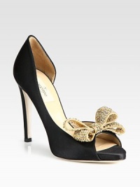 Low-cut, peep toe design of sumptuous satin, topped with a dimensional rhinestone-coated metal bow for extra sparkle. Self-covered heel, 4½ (115mm)Covered platform, ½ (15mm)Compares to a 4 heel (100mm)Satin upper with a metal and rhinestone-coated bowPeep toeLeather lining and solePadded insoleMade in Italy Low-cut, peep toe design of sumptuous satin, topped with a dimensional rhinestone-coated metal bow for extra sparkle. Self-covered heel, 4½ (115mm)Covered platform, ½ (15mm)Compares to a 4 heel (100mm)Satin upper with a metal and rhinestone-coated bowPeep toeLeather lining and solePadded insoleMade in Italy