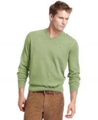 Solid makes a statement with this v-neck sweater from Izod. Solid makes a statement with this v-neck sweater from Izod.