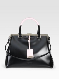 This roomy leather style features a sleek colorblocked design with a detachable logo tag.Double top handles, 5 dropShoulder strap, 9½ dropTop clasp closureThree inside open pockets13¼W X 10H X 7½DMade in Italy This roomy leather style features a sleek colorblocked design with a detachable logo tag.Double top handles, 5 dropShoulder strap, 9½ dropTop clasp closureThree inside open pockets13¼W X 10H X 7½DMade in Italy