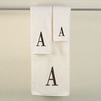 Monogram letter towels: A classic and sophisticated look, this monogrammed collection features a soft, plush oversized 100% combed cotton loop terry towel made of the finest quality materials. Choose from a white towel with a silver metallic embroidered letter of your choice in Bodoni font or an ivory towel with a brown embroidered letter of your choice in Bodoni font. All letters available A - Z. Monogram letter towels: A classic and sophisticated look, this monogrammed collection features a soft, plush oversized 100% combed cotton loop terry towel made of the finest quality materials. Choose from a white towel with a silver metallic embroidered letter of your choice in Bodoni font or an ivory towel with a brown embroidered letter of your choice in Bodoni font. All letters available A - Z.