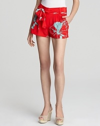 Mini Oonagh by Nanette Lepore shorts play up spring's color trend, flaunting a vivid print on a luxe silk silhouette complete with a chic bow-tie belt. Keep all eyes on the prize and team the look with a simple white tee. Mini Oonagh by Nanette Lepore shorts play up spring's color trend, flaunting a vivid print on a luxe silk silhouette complete with a chic bow-tie belt. Keep all eyes on the prize and team the look with a simple white tee.