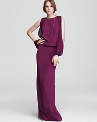 In a rich jewel-tone hue, Nicole Miller's modern split-sleeve dress feels of-the-moment with raglan sleeves and a blouson silhouette. In a rich jewel-tone hue, Nicole Miller's modern split-sleeve dress feels of-the-moment with raglan sleeves and a blouson silhouette.