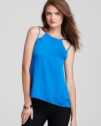 Geometric cutouts bring modern, minimalist chic to this versatile reversible Sachin + Babi top. Geometric cutouts bring modern, minimalist chic to this versatile reversible Sachin + Babi top.