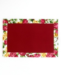 Kissed by a rose. Homewear's Rose Kiss placemats outfit your table with ease, featuring a border of luscious pink and gold blossoms in a machine washable blend. Kissed by a rose. Homewear's Rose Kiss placemats outfit your table with ease, featuring a border of luscious pink and gold blossoms in a machine washable blend.