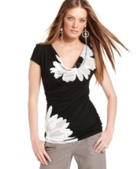 INC's petite cowl-neck top gets an upgrade! The over-sized graphic floral-print creates a chic effect. INC's petite cowl-neck top gets an upgrade! The over-sized graphic floral-print creates a chic effect.