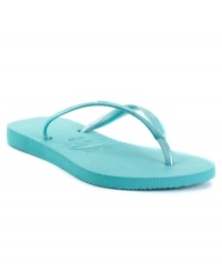 You can't go wrong with the classic cushioned flip flop! These slim sandals by Havaianas continue the tradition with a flat footbed and colorful thong strap. You can't go wrong with the classic cushioned flip flop! These slim sandals by Havaianas continue the tradition with a flat footbed and colorful thong strap.